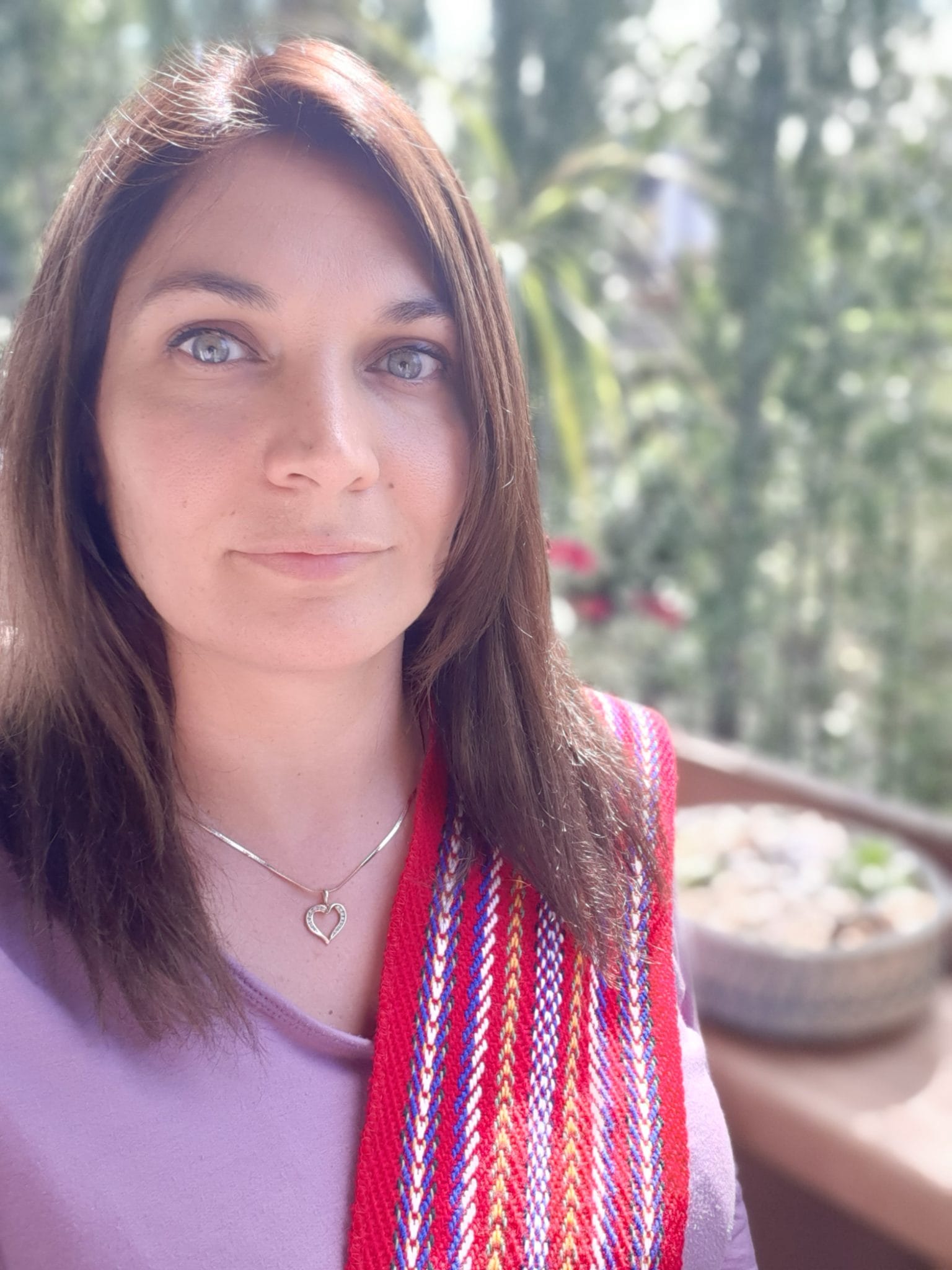 Jennifer Desgagnes looking directly at the camera, outside on a sunny day.