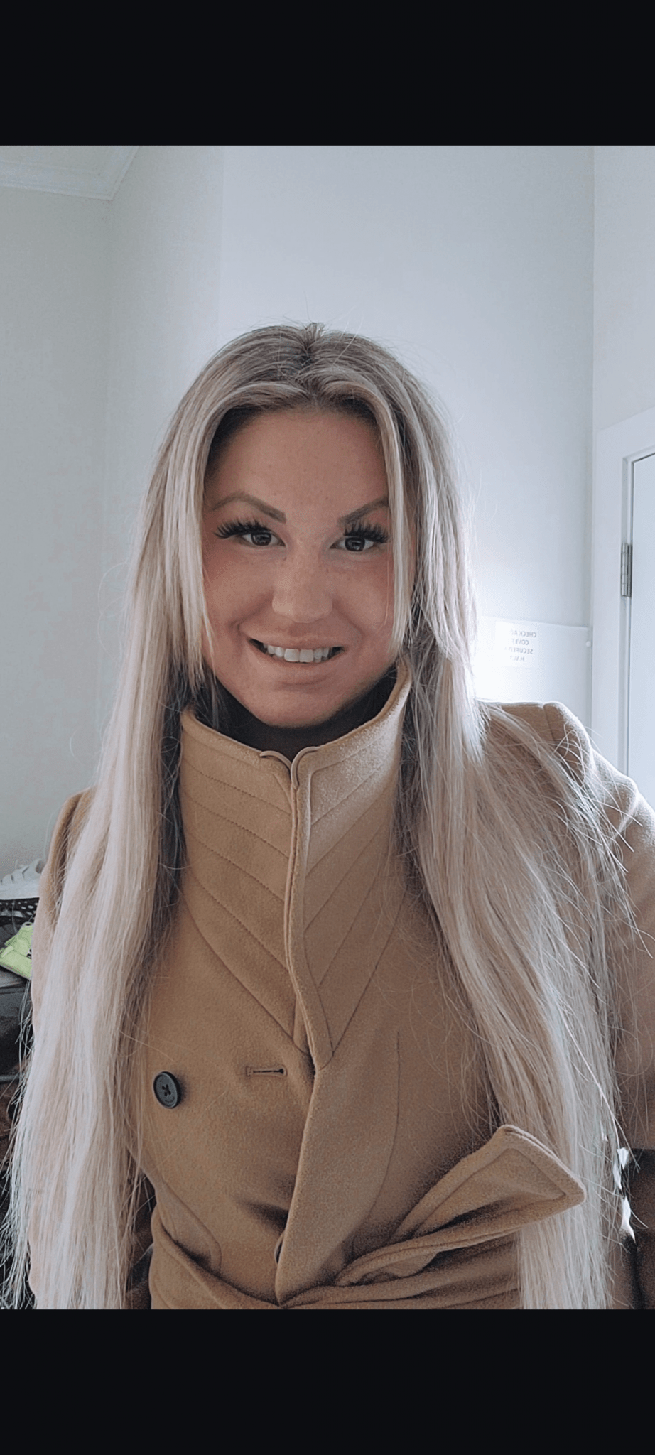 Taylor McLeod smiling, looking directly at the camera. 