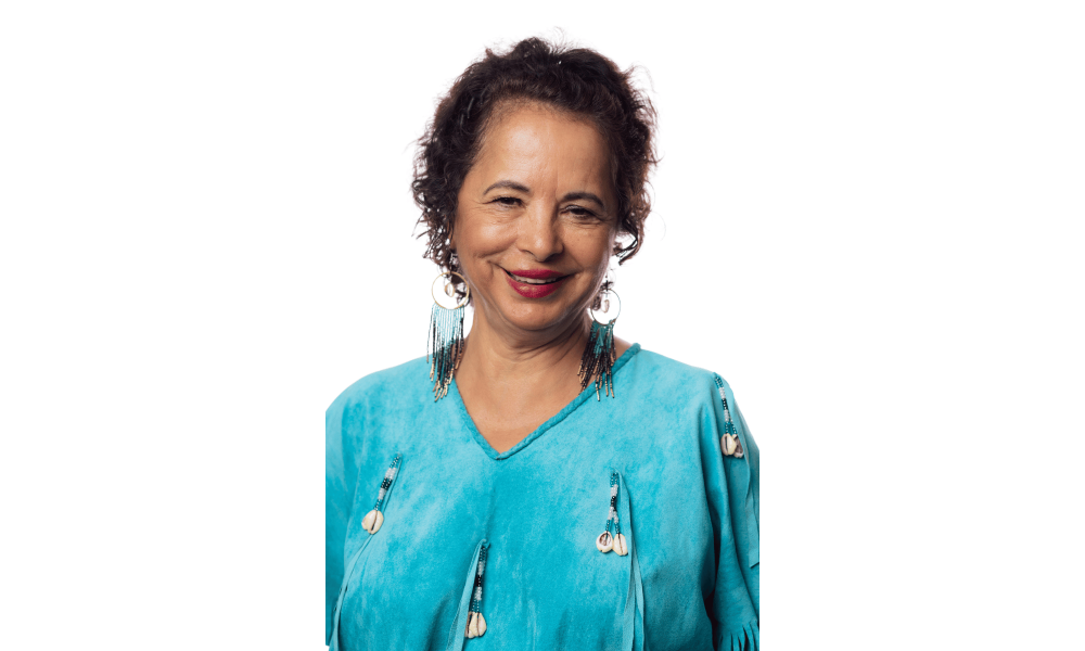 Headshot of a woman in a bright blue shirt.