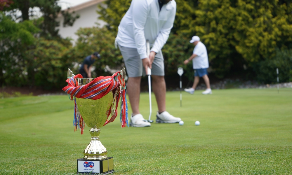 The MNBC Golf Tournament Trophy sits on the putting green at Hazelmere Golf & Country Club