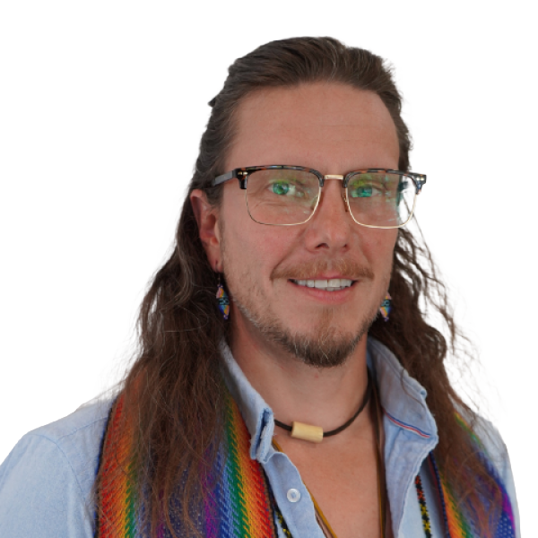 Topher Burke is smiling in a blue long-sleeved collared shirt and a rainbow Métis sash draped over their shoulders against a white background.